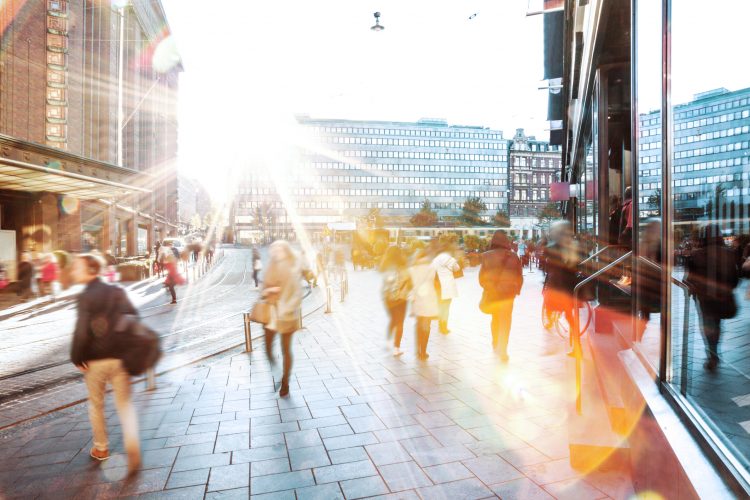Motion Blur Of People Walking In The City